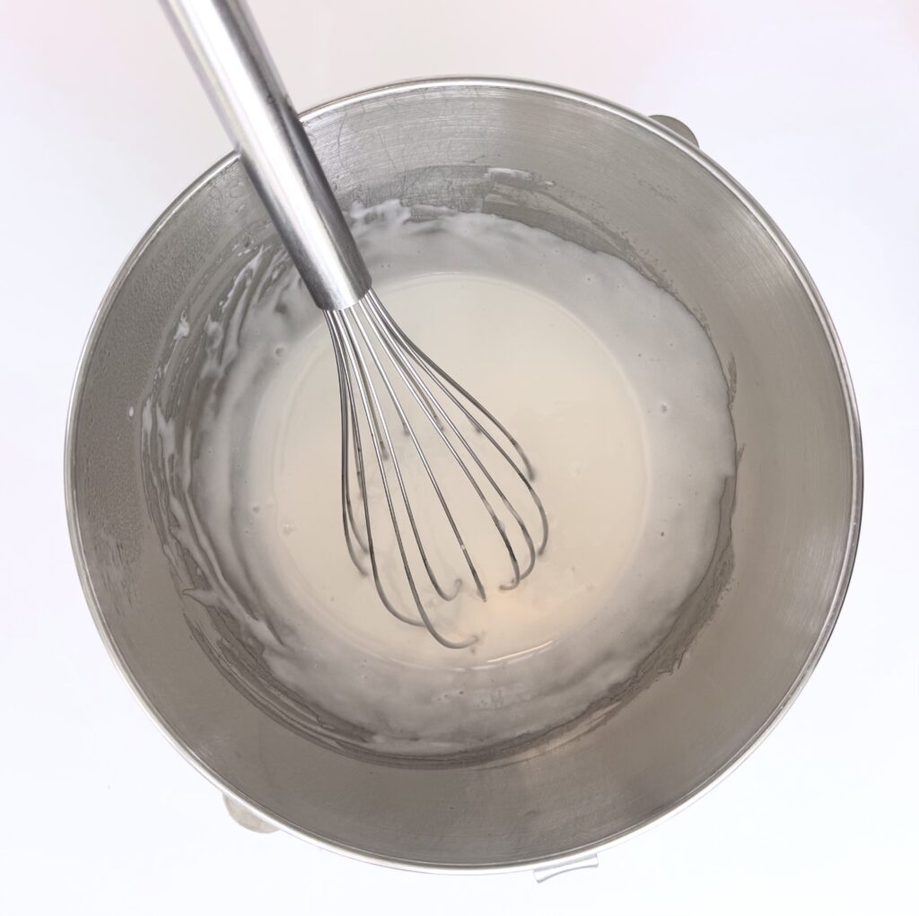 egg whites and sugar after heating to 180 degrees Fahrenheit